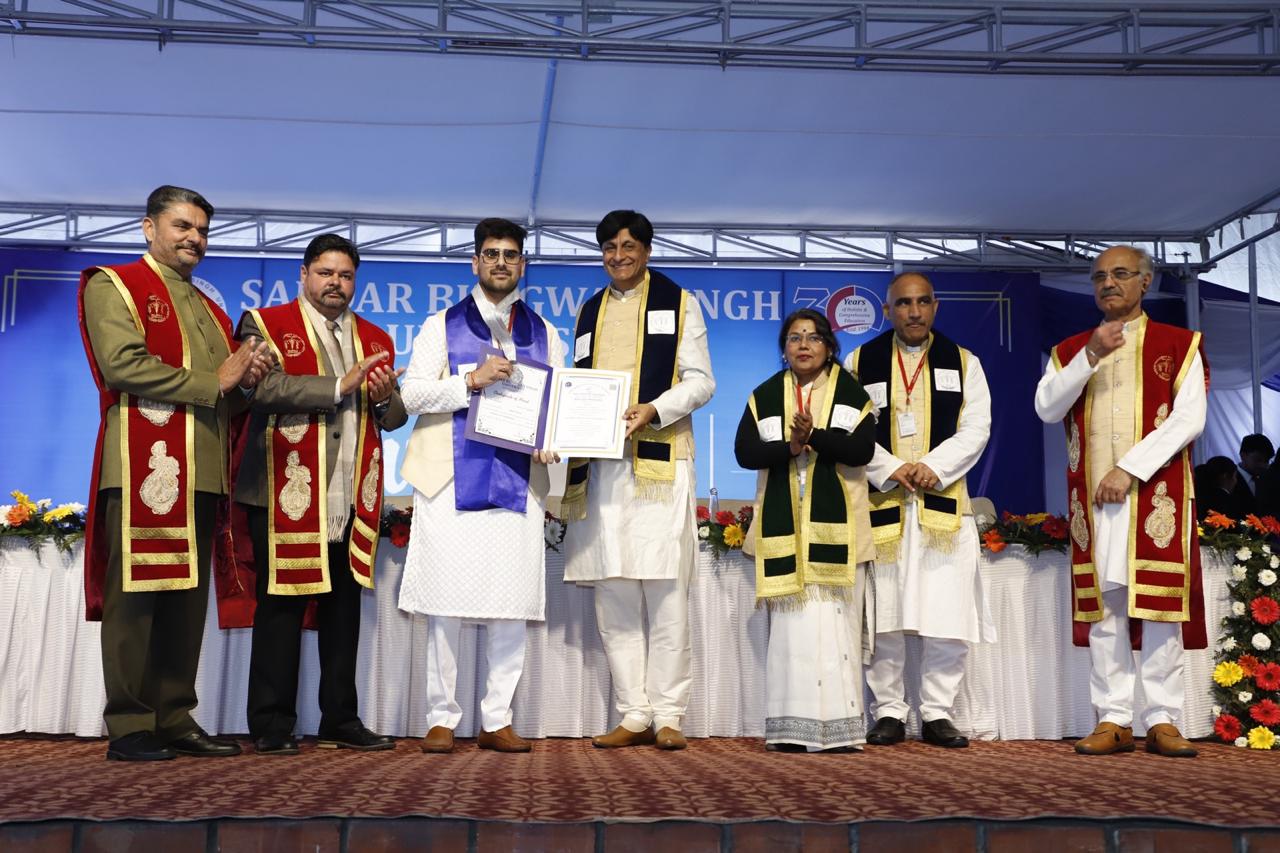 Dr. Saiyam Narula receiving his degree at convocation