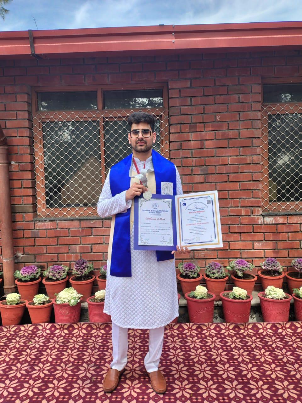 Dr. Saiyam Narula with his silver medal and degree